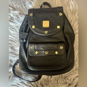 MCM black backpack with gold studs. Gorgeous bag!